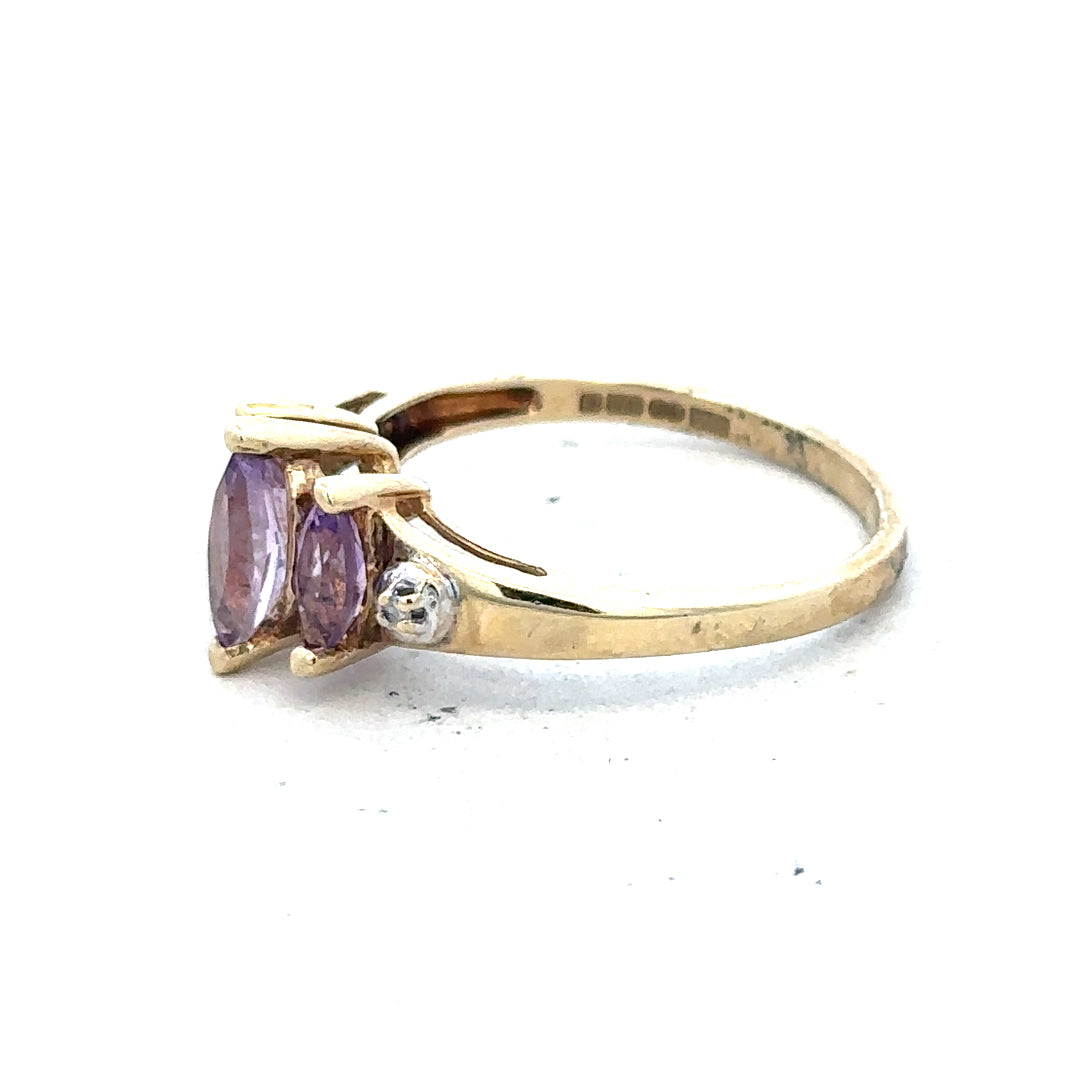 Elegant 9ct yellow gold amethyst and diamond ring in size P, featuring a sparkling purple gemstone and delicate gold band.