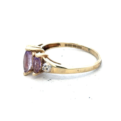 Elegant 9ct yellow gold amethyst and diamond ring in size P, featuring a sparkling purple gemstone and delicate gold band.