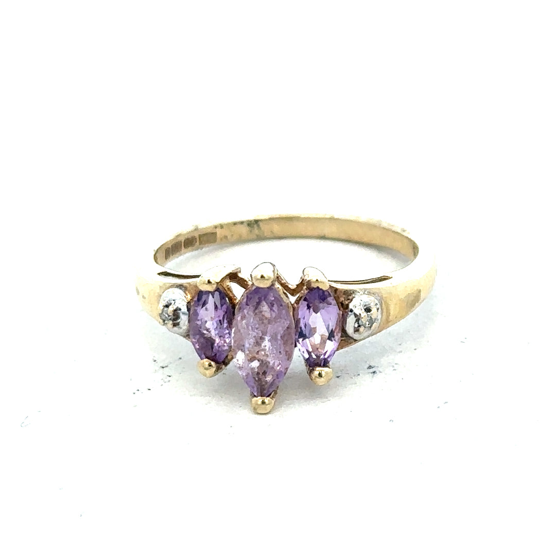 9ct yellow gold amethyst and diamond ring in size P, featuring a vibrant purple gemstone and sparkling accents.