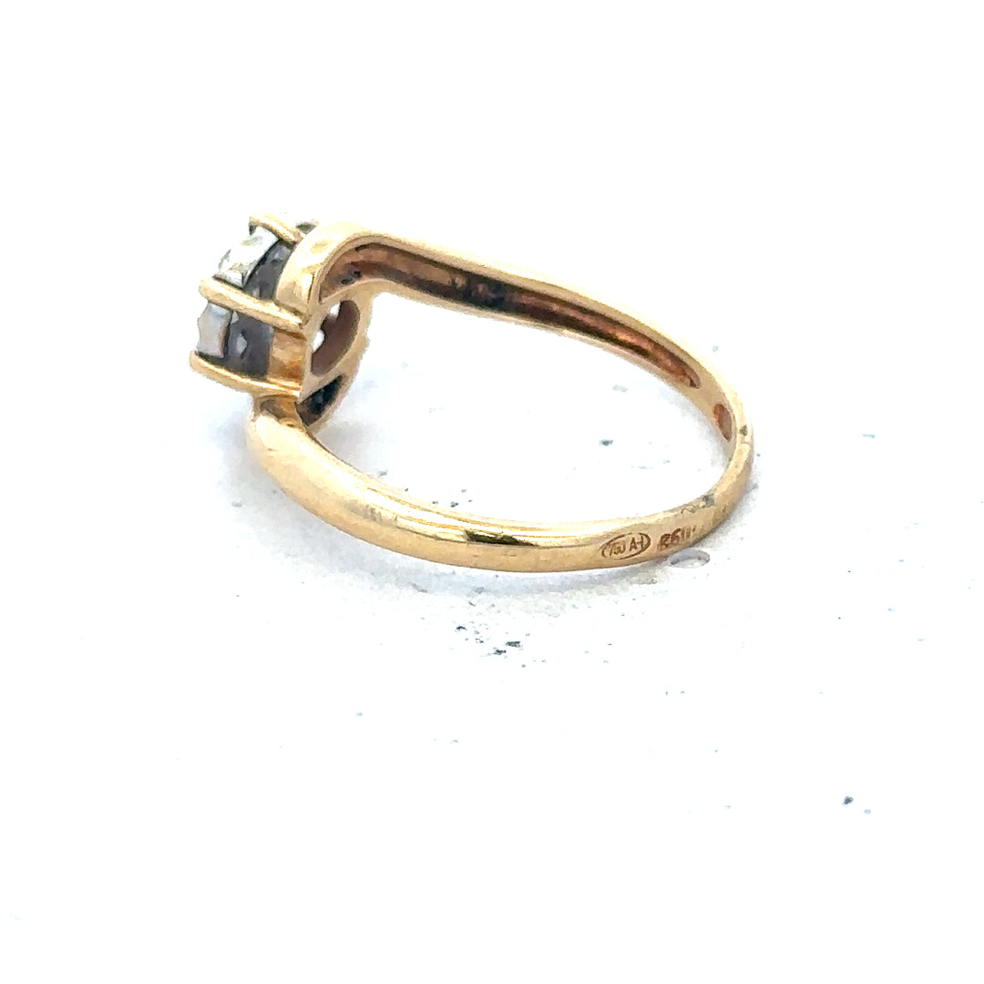18ct yellow gold diamond ring in size L1/2, featuring a sparkling diamond setting and a sleek, elegant design.