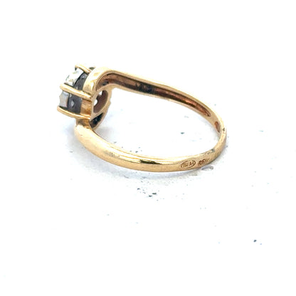 18ct yellow gold diamond ring in size L1/2, featuring a sparkling diamond setting and a sleek, elegant design.