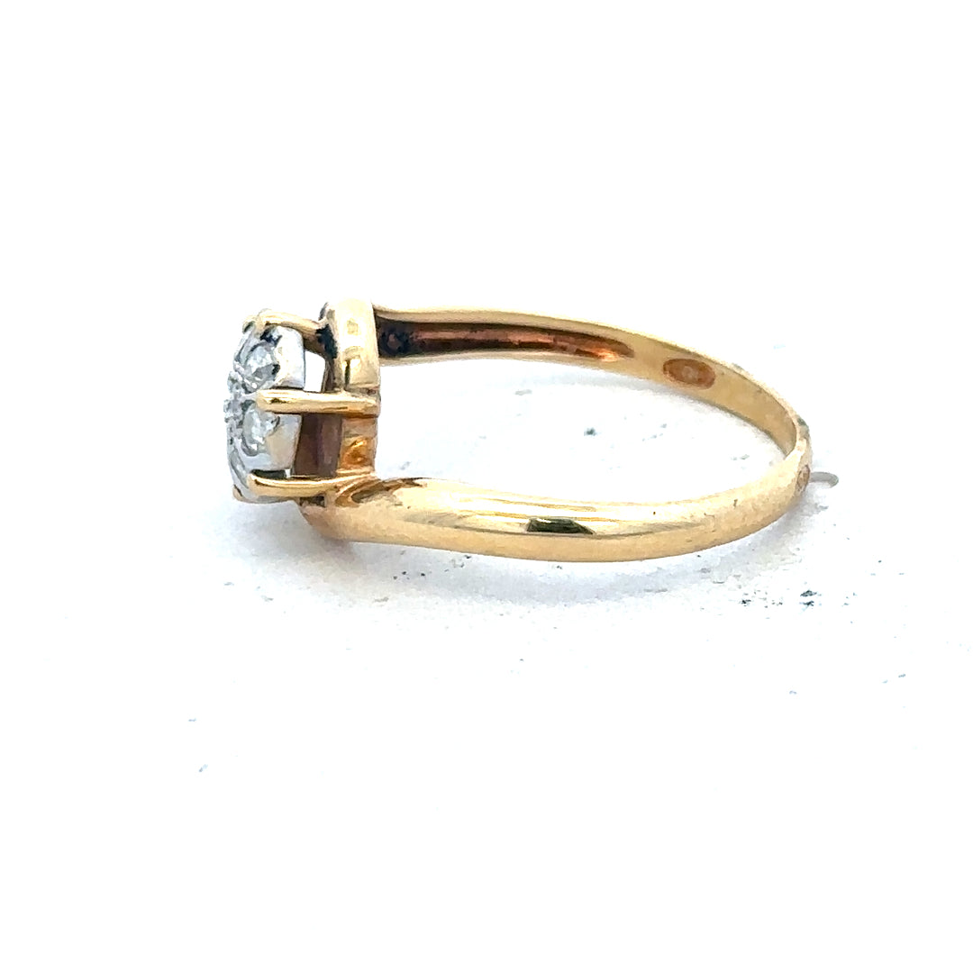 18ct yellow gold diamond ring with intricate design, size L1/2, showcasing sparkling diamonds on a polished band.