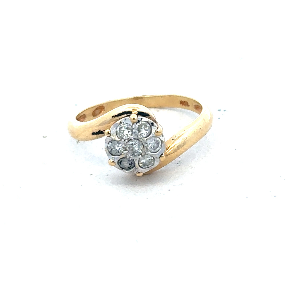 18ct yellow gold diamond ring size L1/2 with sparkling diamonds, showcasing elegant jewelry design and craftsmanship.