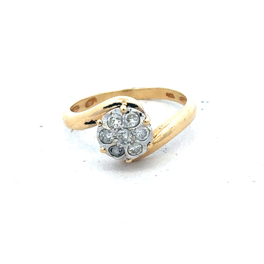 18ct yellow gold diamond ring size L1/2 with sparkling diamonds, showcasing elegant jewelry design and craftsmanship.