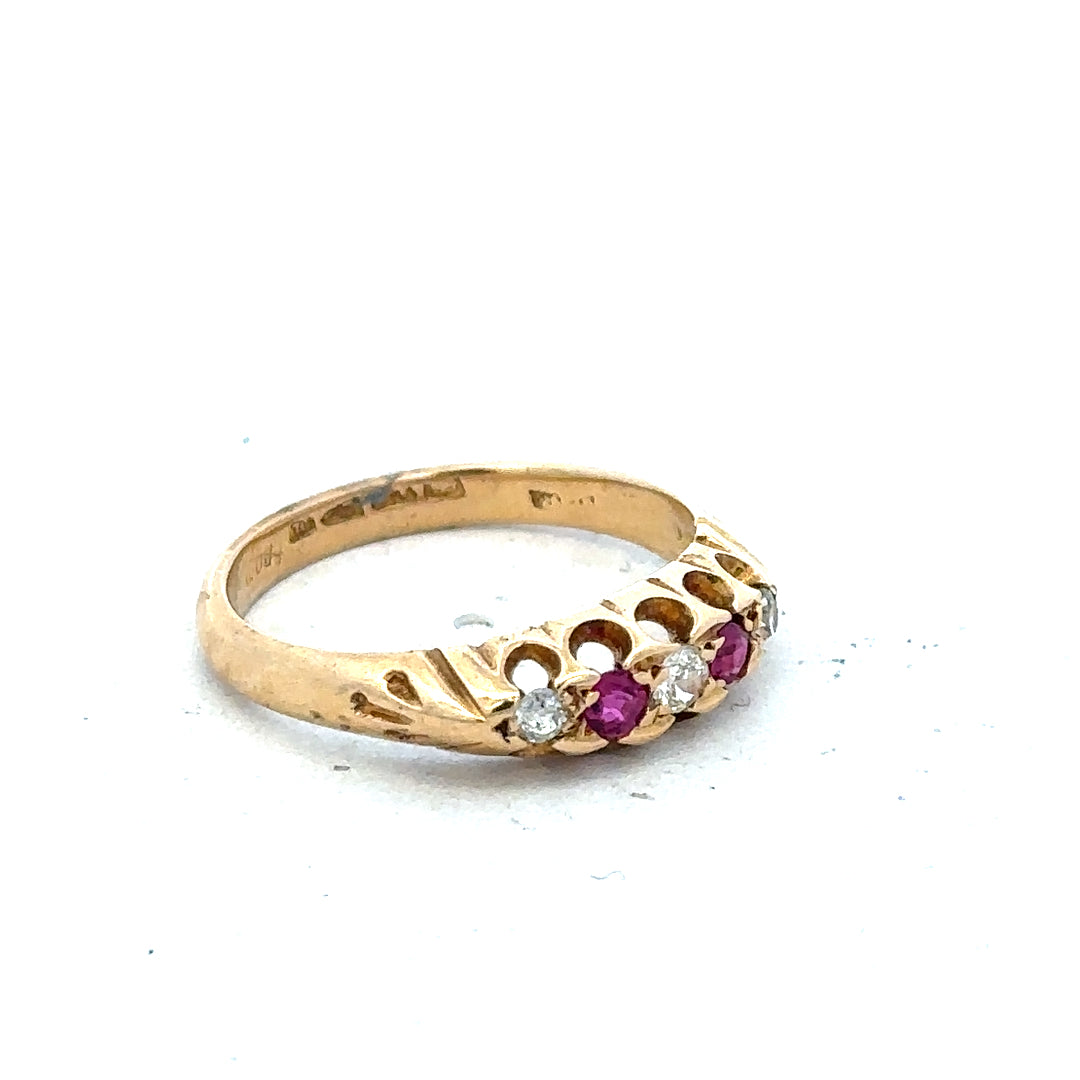 18ct yellow gold diamond and ruby ring, size N, featuring a sparkling central ruby and diamond accents.