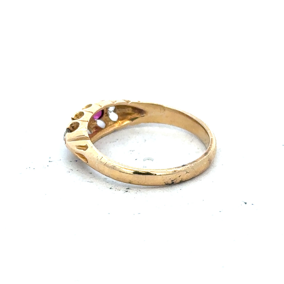 18ct yellow gold diamond and ruby ring in size N, featuring a detailed design with sparkling gemstones.