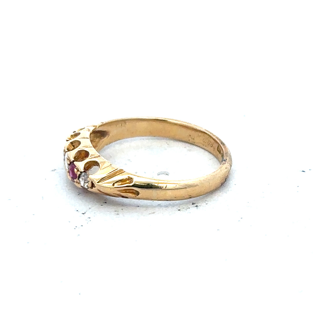 18ct yellow gold ring with diamonds and rubies, size N, featuring elegant gemstone details and a polished finish.
