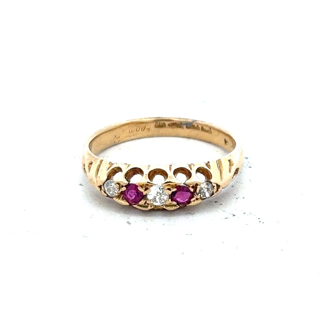 18ct yellow gold diamond and ruby ring, size N, featuring sparkling gemstones and a sleek band design.