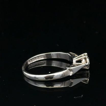 9ct white gold diamond ring with sparkling diamonds, showcasing elegant jewelry design and craftsmanship.