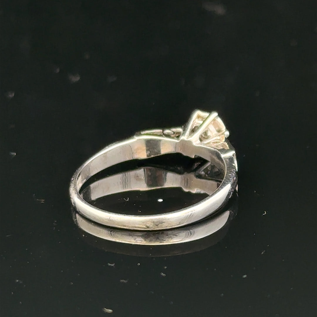 9ct white gold diamond ring with sparkling diamonds, showcasing elegant jewelry design and fine craftsmanship.
