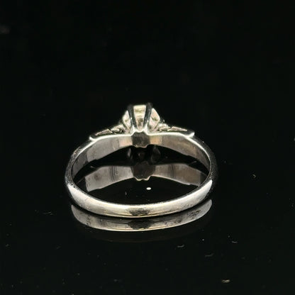9ct white gold diamond ring with sparkling gemstones, showcasing elegant craftsmanship and a polished finish.