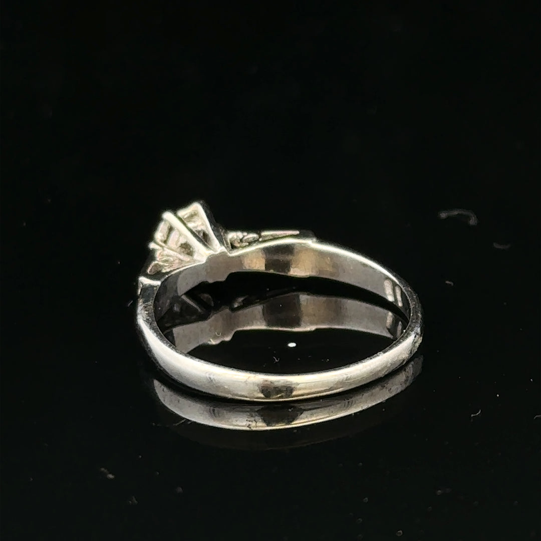 9ct white gold diamond ring with sparkling diamonds, showcasing elegant jewelry design and craftsmanship.