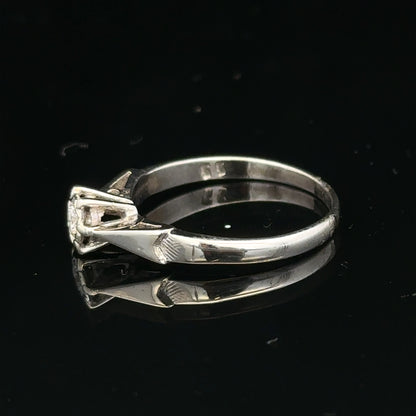 9ct white gold diamond ring with sparkling stones, showcasing elegant design and fine craftsmanship.