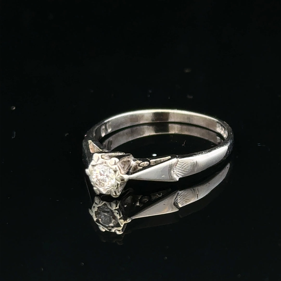 9ct white gold diamond ring with sparkling stones, elegant jewelry piece featuring a classic design and unbranded craftsmanship.
