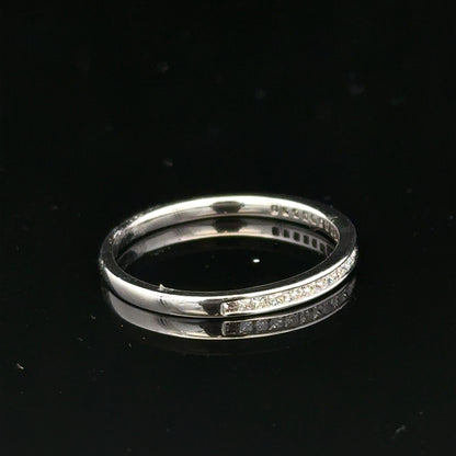 18ct white gold diamond ring in size Q1/2 with sparkling diamonds, unbranded, shown from an angled view.