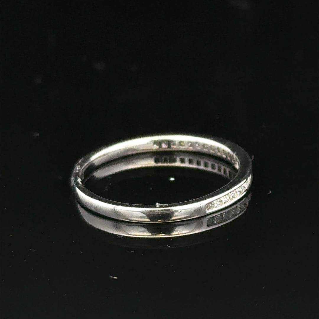 18ct white gold diamond ring size Q1/2 with sparkling diamonds, displayed on a neutral background.
