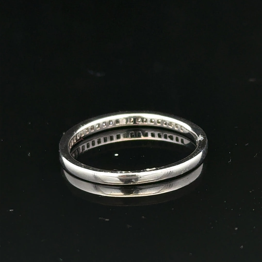18ct white gold diamond ring in size Q1/2 featuring sparkling diamonds and a sleek band design.