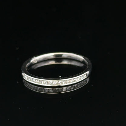 18ct white gold diamond ring size Q1/2 with sparkling diamonds, unbranded jewelry showcasing elegant craftsmanship and fine detail.