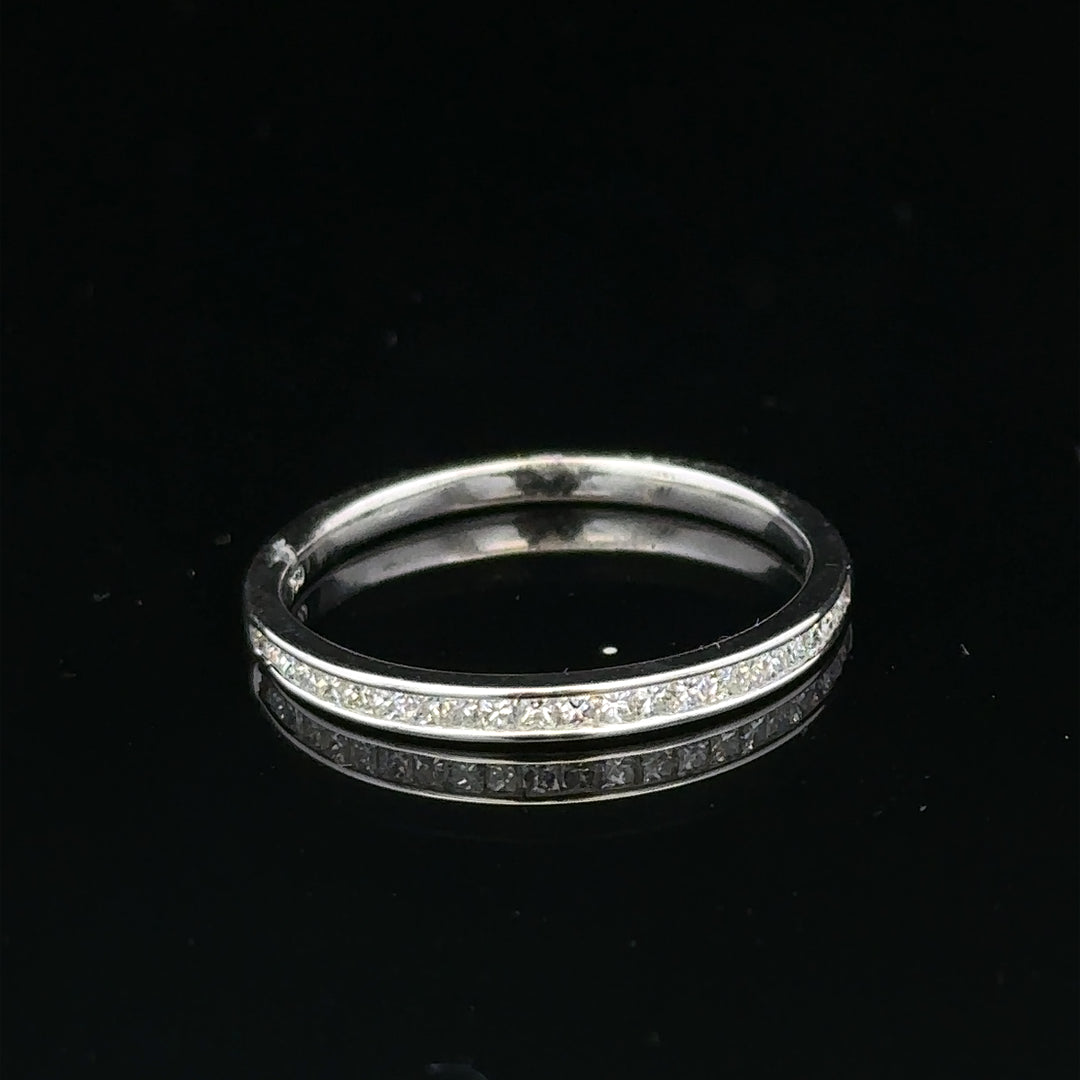 18ct white gold diamond ring size Q1/2 with sparkling diamonds, elegant jewelry piece with a polished band and intricate design.
