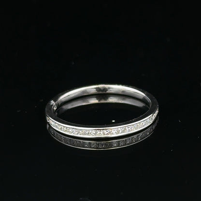 18ct white gold diamond ring size Q1/2 with sparkling diamonds, elegant jewelry piece with a polished band and intricate design.