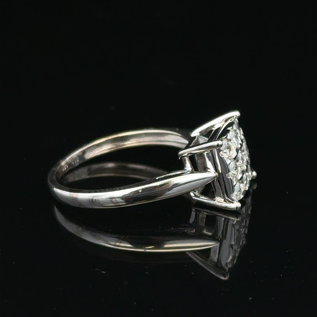 9ct white gold half carat diamond ring with a solitaire setting, showcasing a sparkling diamond on a sleek band.