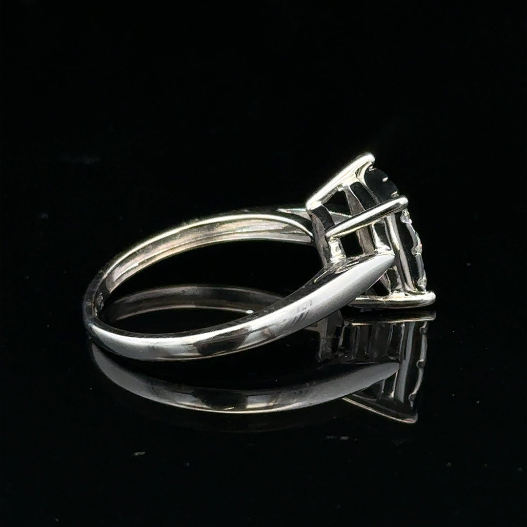9ct white gold half carat diamond ring with a central sparkling diamond and elegant band, unbranded jewelry in the image.