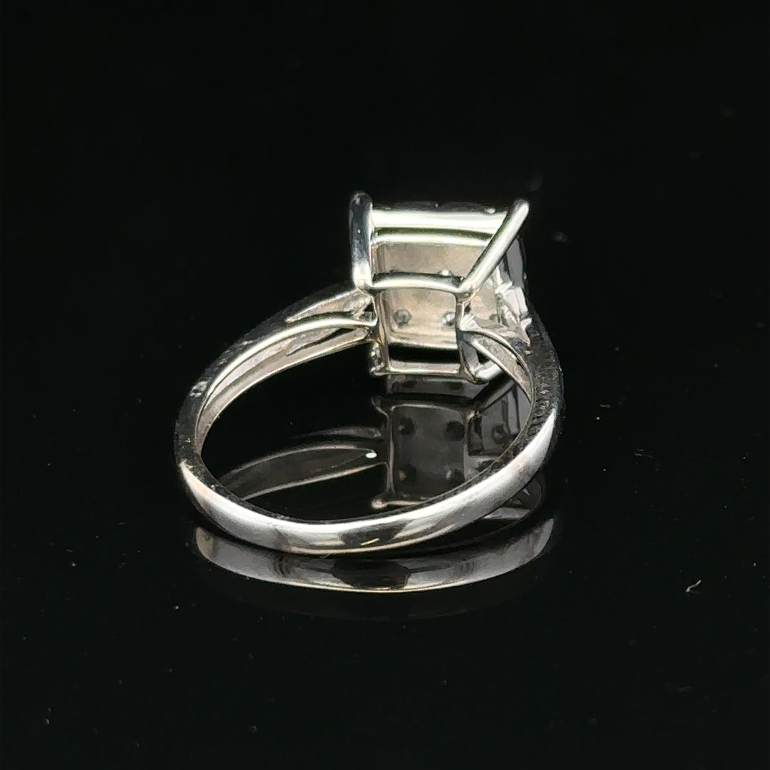 9ct white gold half carat diamond ring with a central diamond and elegant band, unbranded jewelry for special occasions.