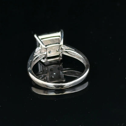 9ct white gold half carat diamond ring with a central diamond and elegant band, showcasing fine jewelry craftsmanship.