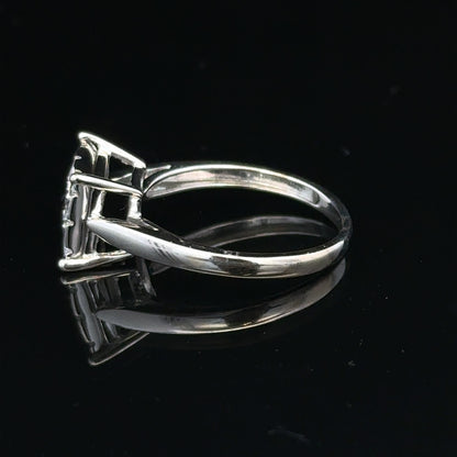9ct white gold half carat diamond ring with a central diamond and delicate band, showcasing fine jewelry craftsmanship.