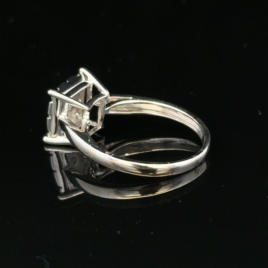 9ct white gold half carat diamond ring with a central diamond and elegant band, showcasing fine craftsmanship and sparkle.