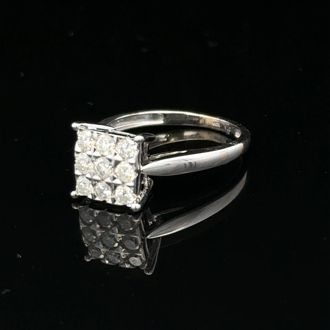 Half carat diamond ring in 9ct white gold with a sleek design, featuring sparkling diamonds on an elegant band.