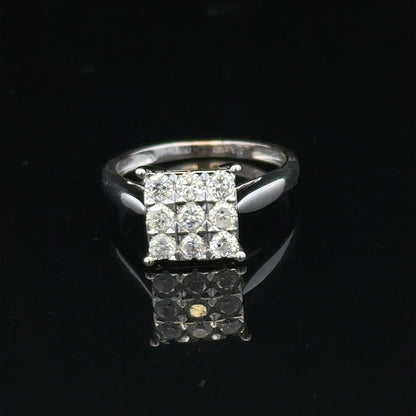 9ct white gold diamond ring with half-carat center stone, featuring a sleek band and sparkling design.