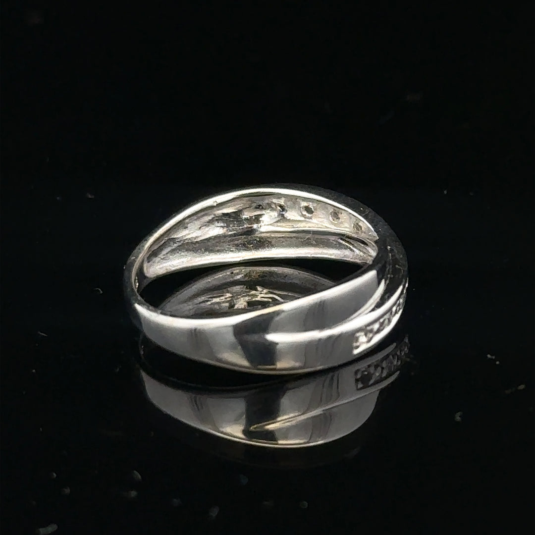 9ct white gold diamond ring size J1/2 with sparkling diamonds, showcasing elegant jewelry design on a white background.