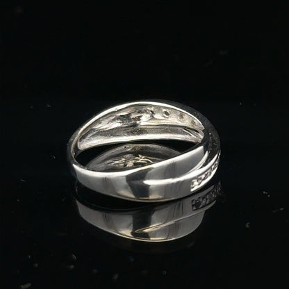 9ct white gold diamond ring size J1/2 with sparkling diamonds, showcasing elegant jewelry design on a white background.
