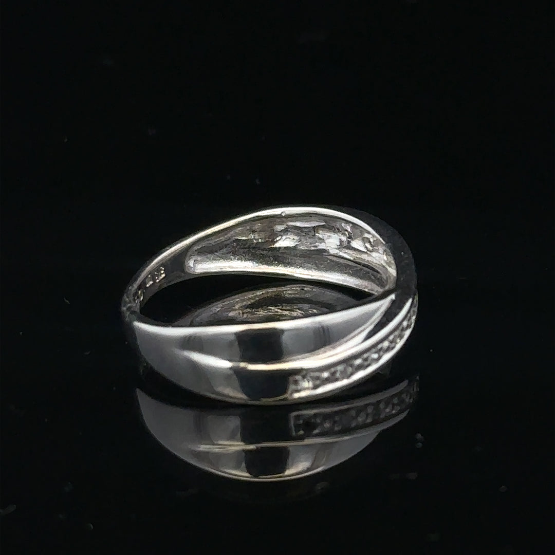 9ct white gold diamond ring in size J1/2 featuring a sparkling diamond setting on a sleek band.