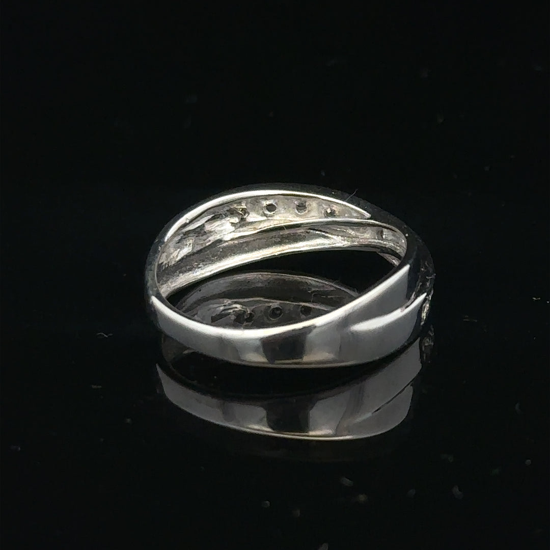 9ct white gold diamond ring size J1/2 with sparkling diamonds, showcasing elegant jewelry design and craftsmanship.