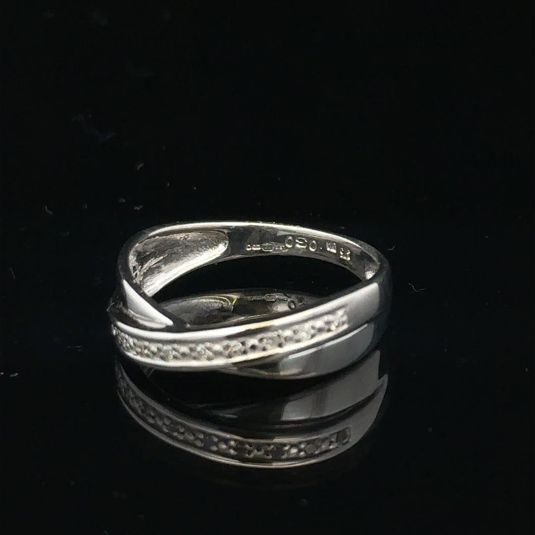 9ct white gold diamond ring size J1/2 with sparkling diamonds on a sleek band, unbranded jewelry for elegant style.