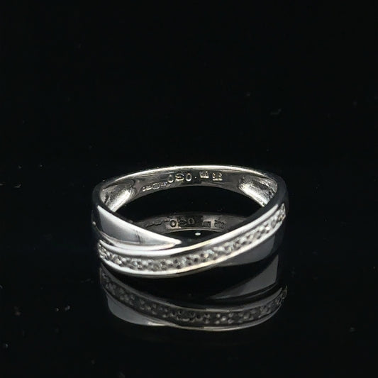 9ct white gold diamond ring size J1/2 with sparkling diamonds, showcasing elegant jewelry design and craftsmanship.