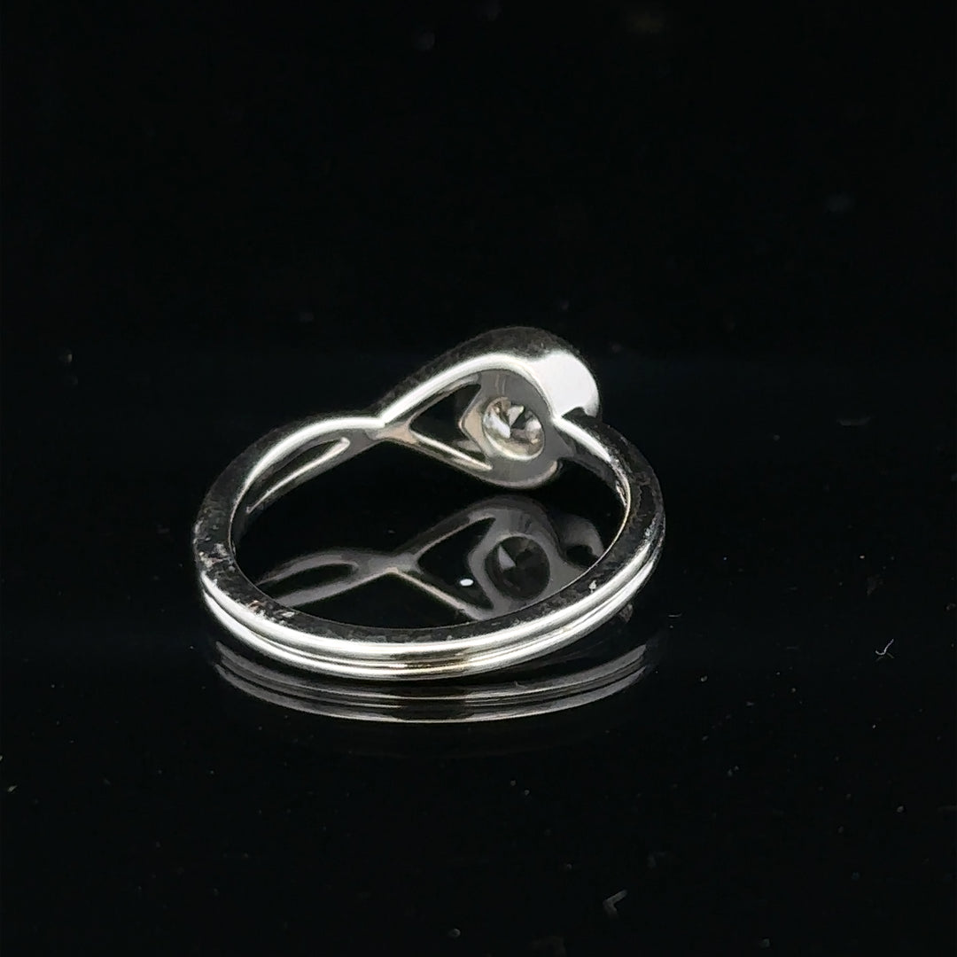 14ct white gold lab-grown diamond ring size I with sparkling diamonds, showcasing elegant craftsmanship and a polished finish.