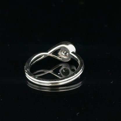 14ct white gold lab-grown diamond ring size I with sparkling diamonds, showcasing elegant craftsmanship and a polished finish.