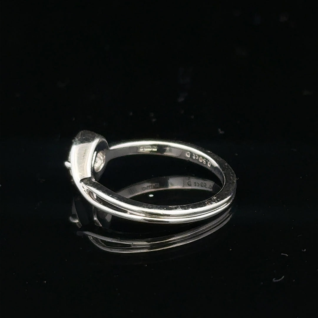 14ct white gold lab-grown diamond ring in size I, featuring a sparkling central diamond and elegant band design.