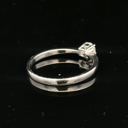 18ct white gold diamond ring with 1/4 carat round cut diamond in size P1/2, elegant jewelry piece with fine detailing.