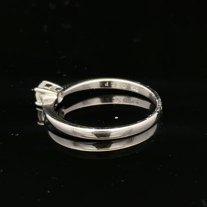 18ct white gold diamond ring with 1/4 carat solitaire, size P1/2, featuring a sparkling diamond on a sleek band.