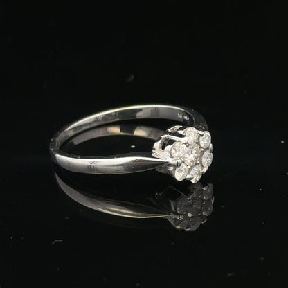 9ct white gold diamond cluster ring size O 1/2 with sparkling diamond accents, elegant jewelry piece.