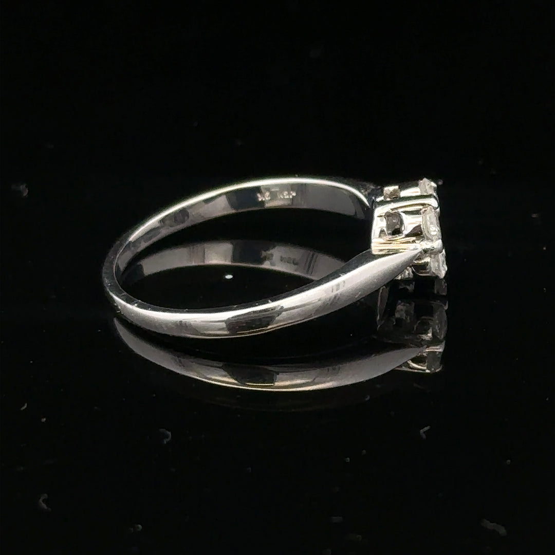 9ct white gold diamond cluster ring in size O 1/2, featuring a sparkling diamond cluster design, unbranded jewelry piece.