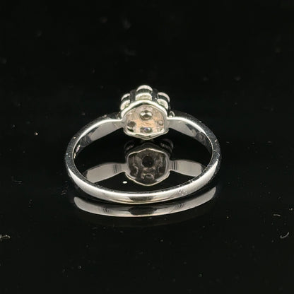 9ct white gold diamond cluster ring size O 1/2 with sparkling diamond accents, showcasing elegant jewelry design.