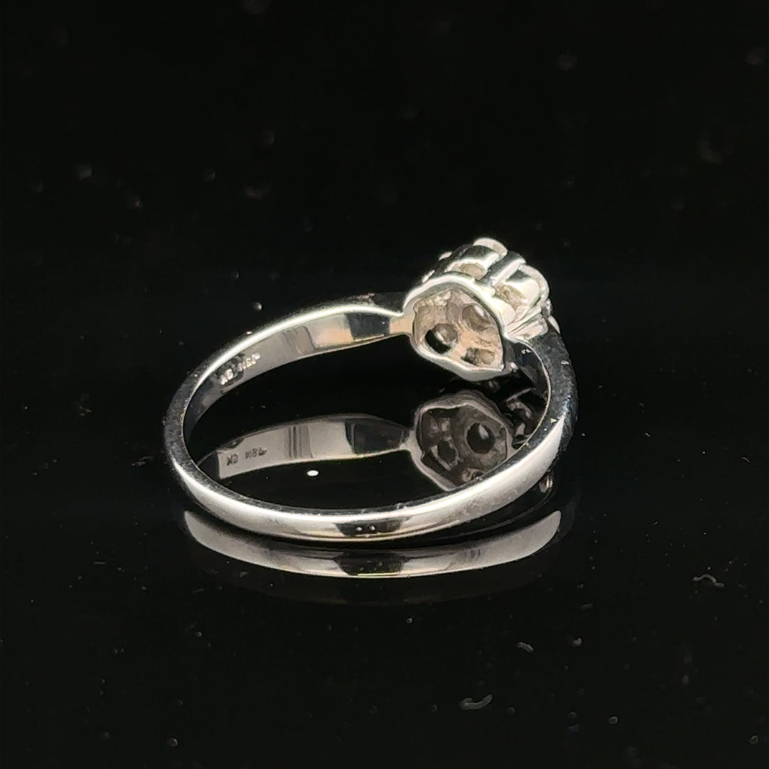 9ct white gold diamond cluster ring size O 1/2 featuring a sparkling diamond cluster setting.
