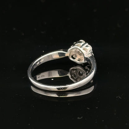 9ct white gold diamond cluster ring size O 1/2 featuring a sparkling diamond cluster setting.