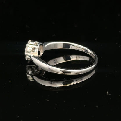 9ct white gold diamond cluster ring size O 1/2 with sparkling diamond accents on a jewelry display.