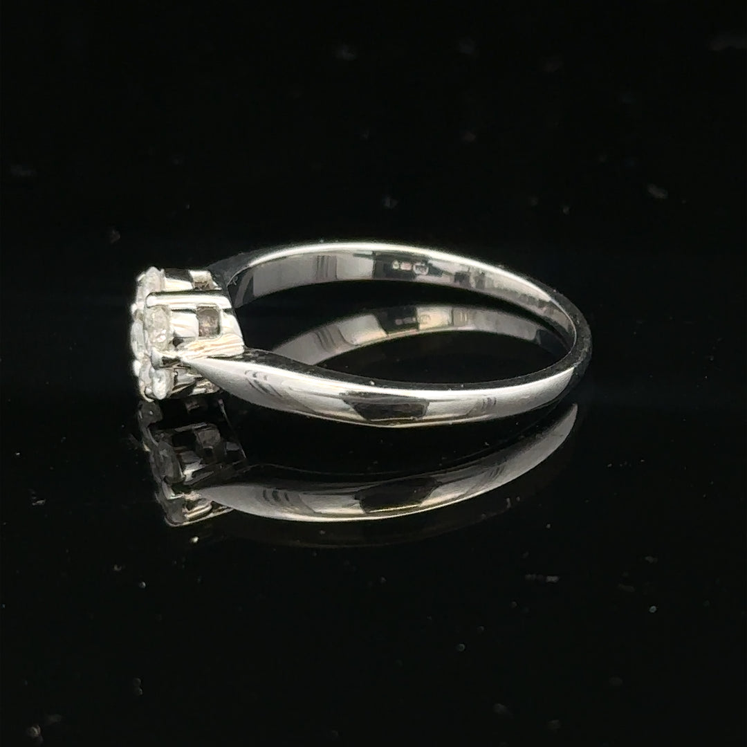 9ct white gold diamond cluster ring size O 1/2 with sparkling diamonds, showcasing a elegant jewelry design.